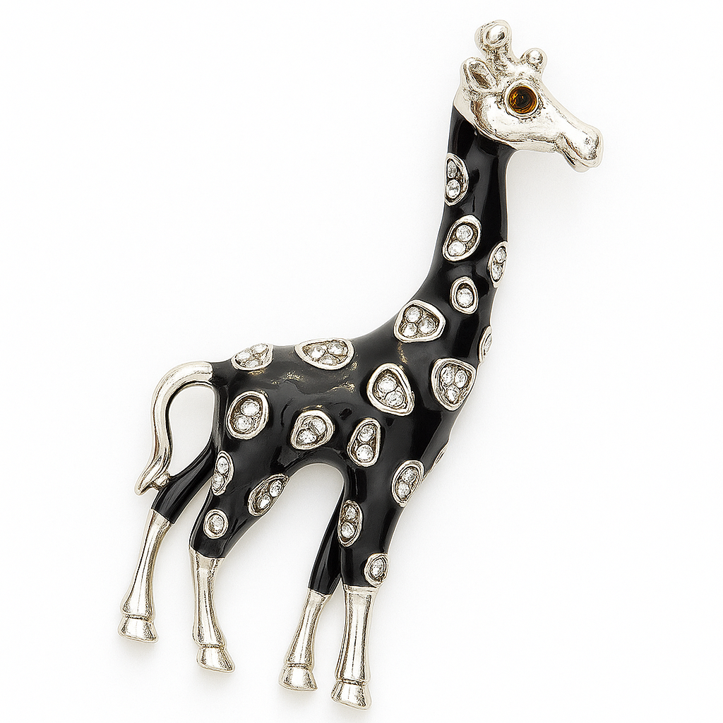 Giraffe-shaped brooch with black and white design on a white background