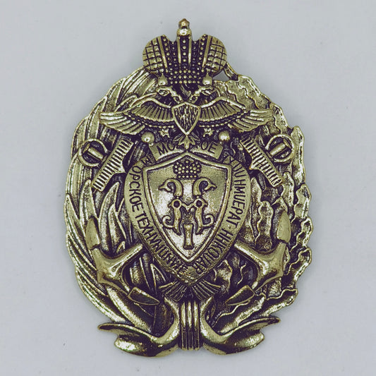 Bronze military badge with intricate
