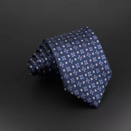 Navy blue tie with a subtle pattern