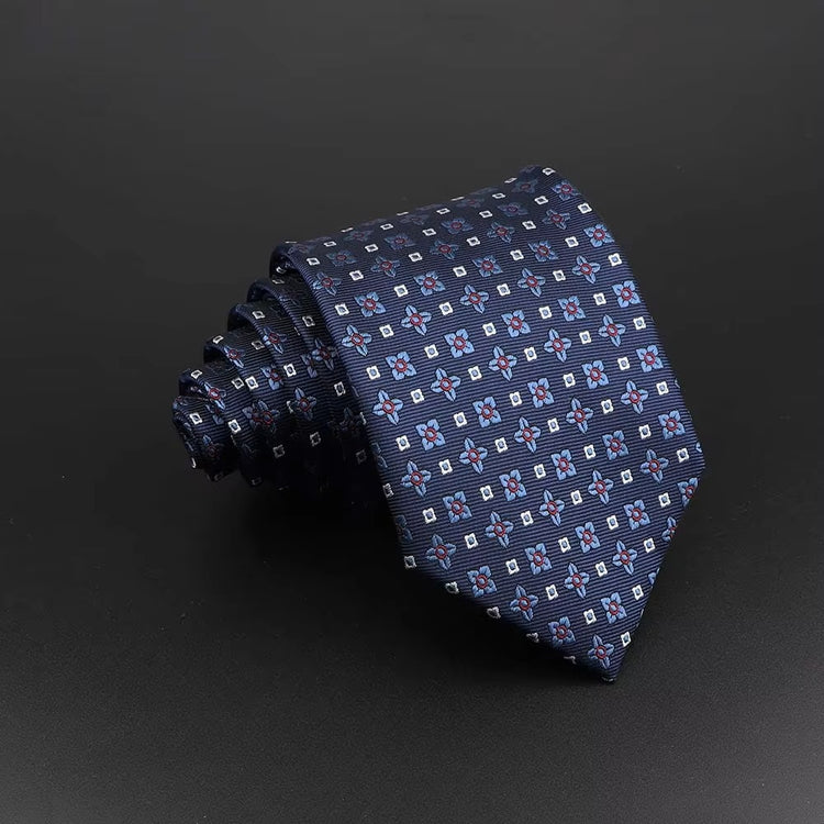Navy blue tie with a subtle pattern