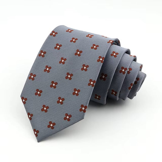 Gray tie with brown floral pattern on a white background
