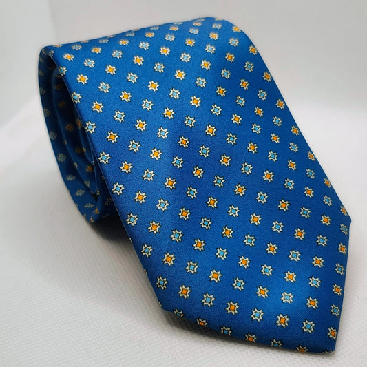 Blue tie with star pattern on a white background