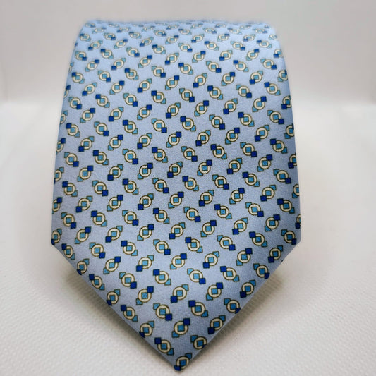 Patterned tie on a light gray background