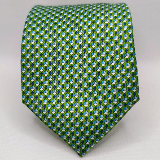 Green tie with geometric pattern on a white background