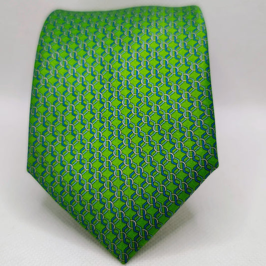 Green tie with geometric pattern on a white background