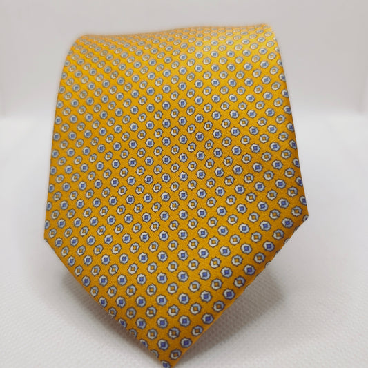 Yellow tie with a small pattern on a white background