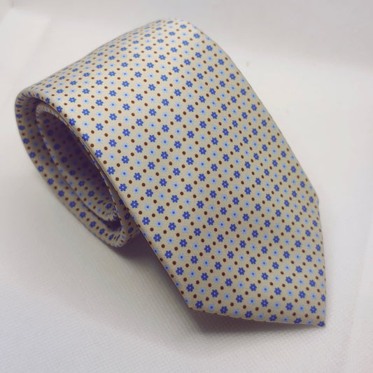 Folded fabric with blue floral pattern on a white background