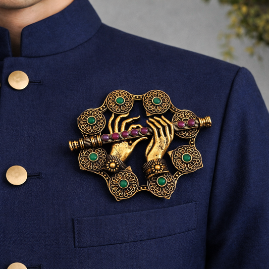 Divine Murli Hands Brooch – Antique Gold with Emerald & Ruby Accents