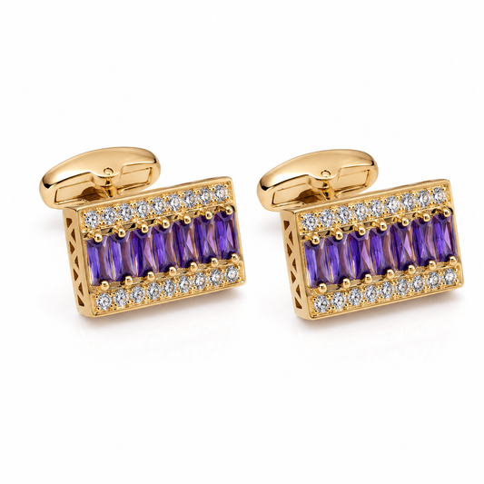 Gold cufflinks with purple gemstones and clear stones on a white background
