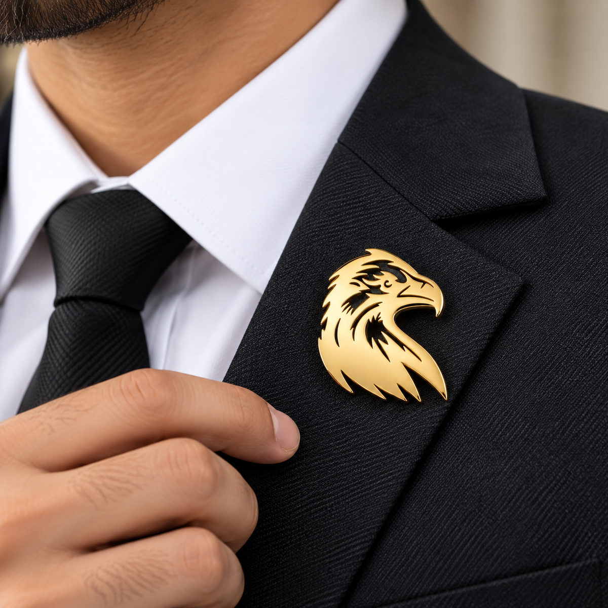 Albetro The Garuda bold gold eagle brooch on black suit lapel