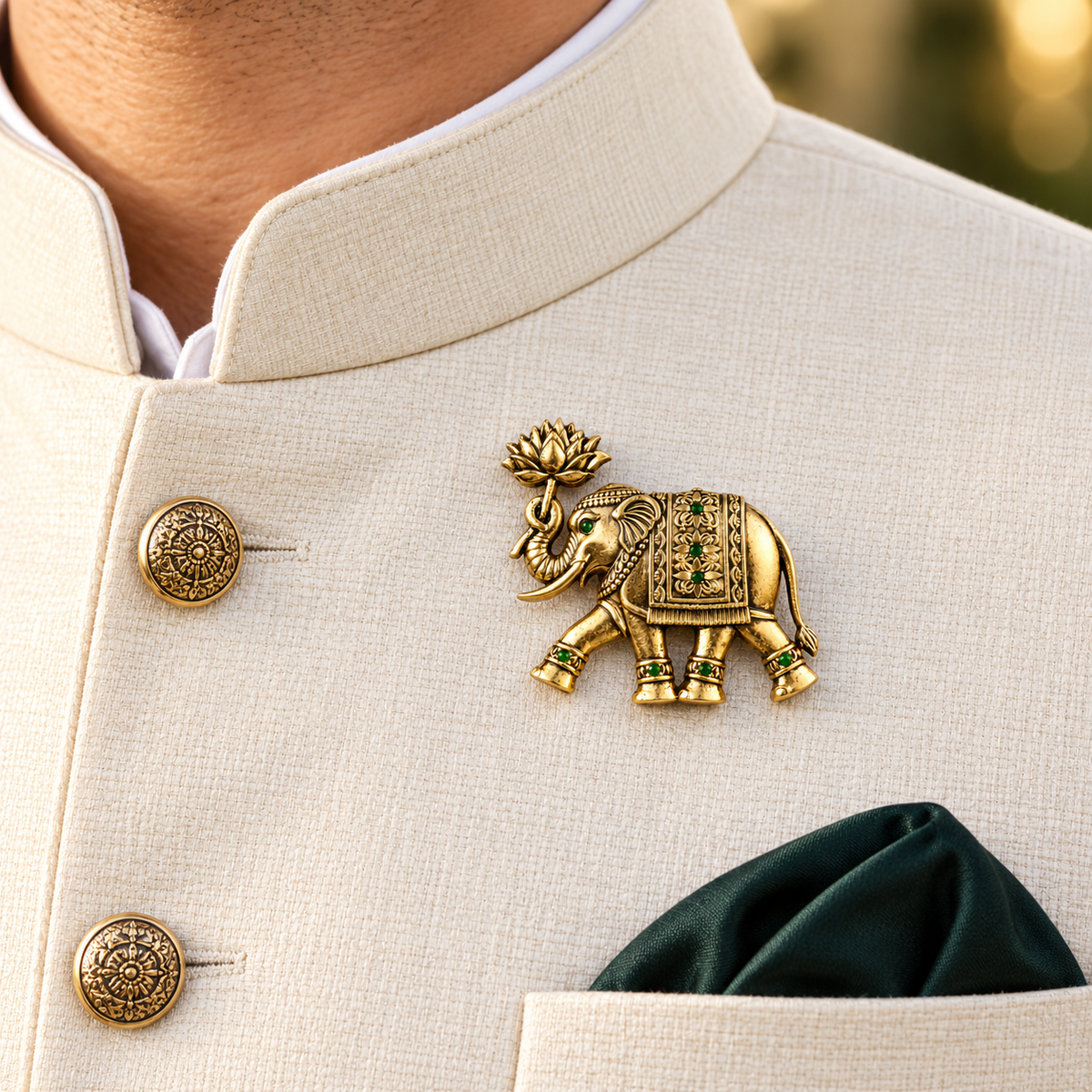 Albetro The Lotus Gaja antique gold elephant brooch on cream bandhgala