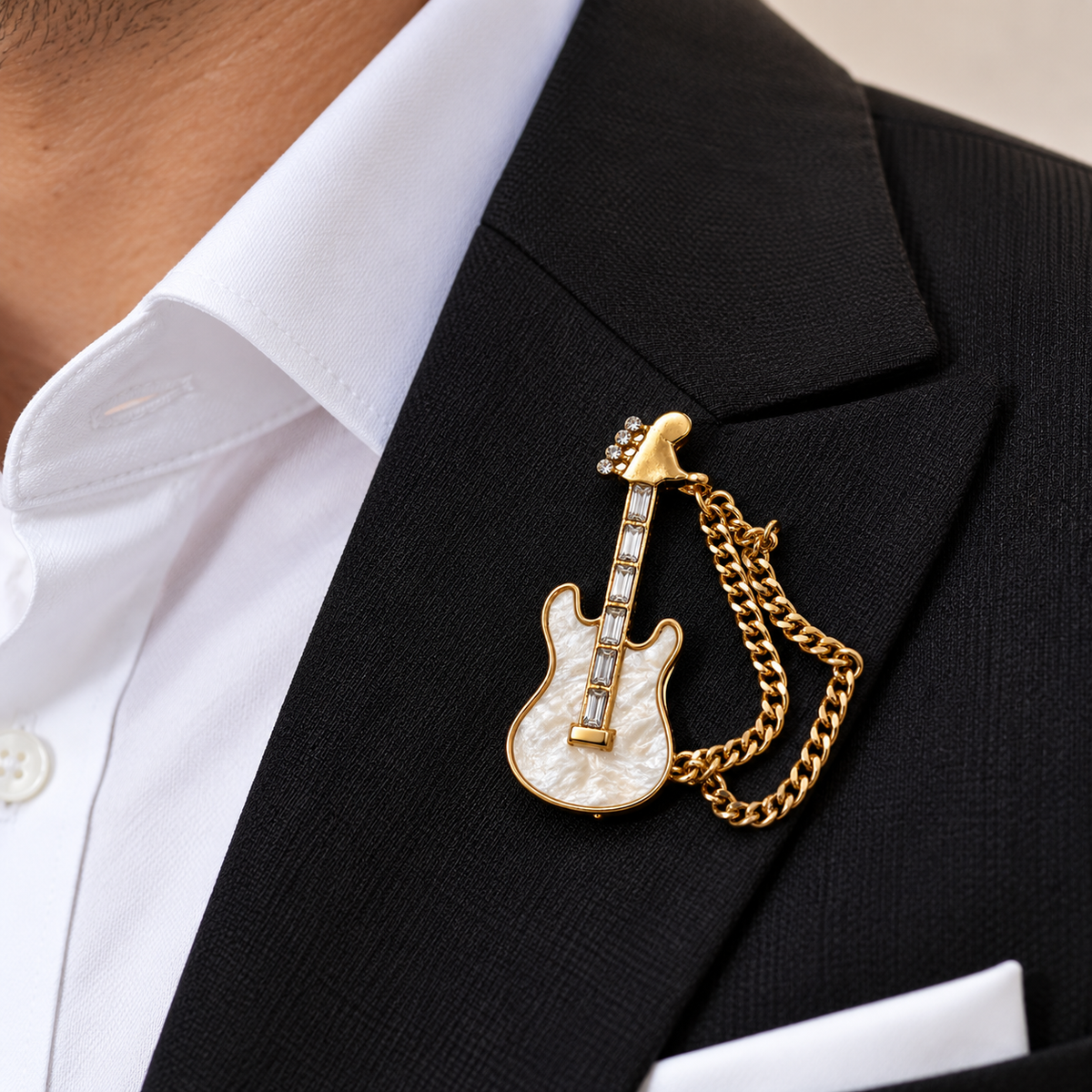 Albetro The Rockstar d'Or gold pearl guitar chain brooch on black suit lapel