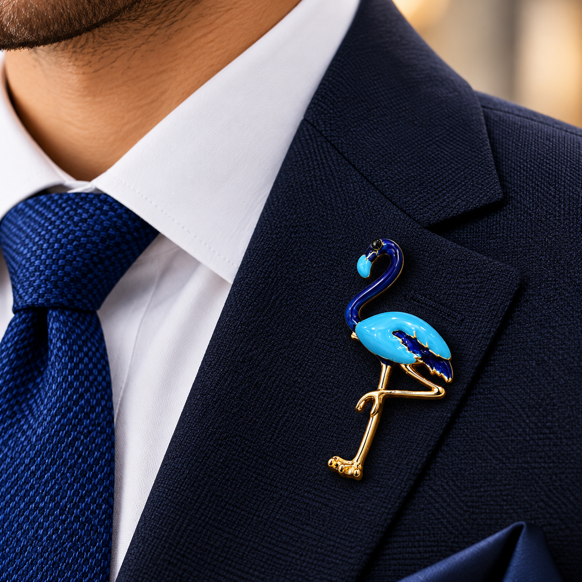 Albetro The Azure Flamingo blue enamel gold brooch on navy suit lapel