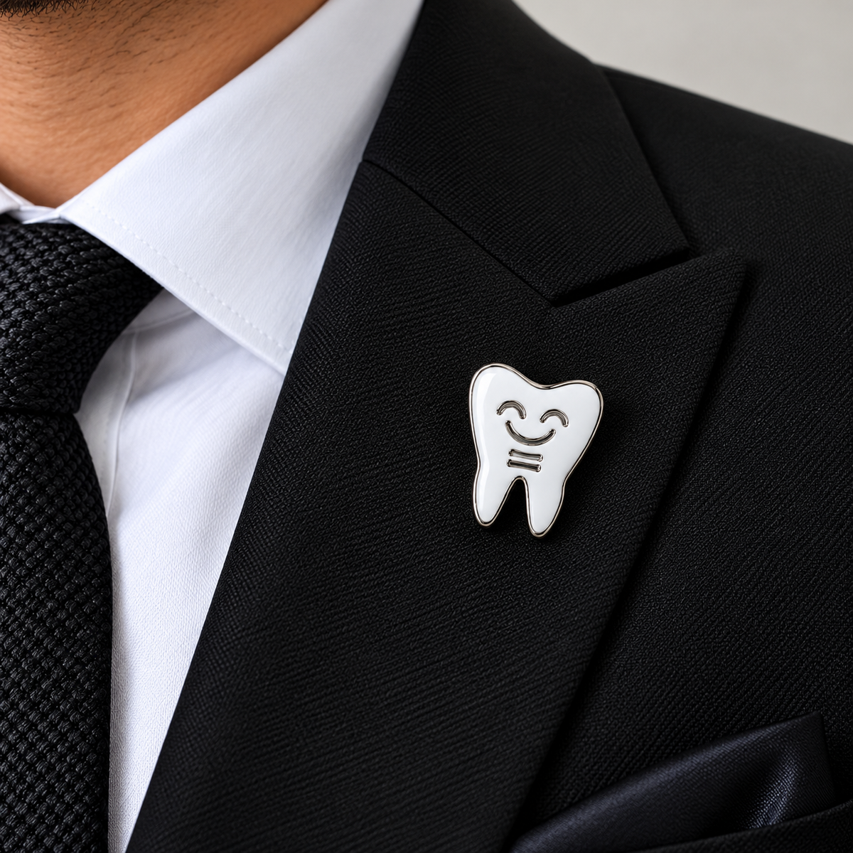 Albetro The Happy Molar white tooth dentist brooch on black suit lapel