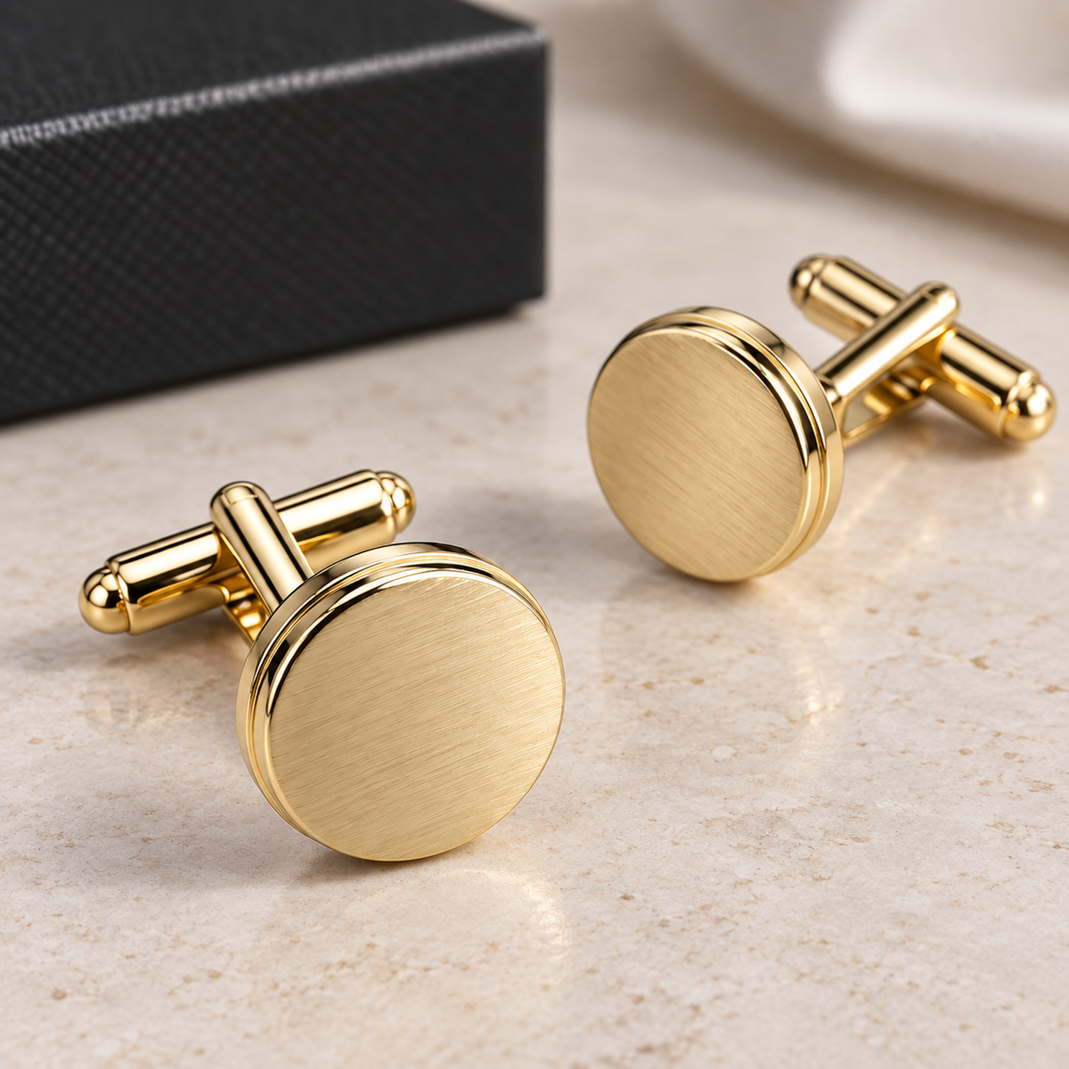 Albetro Midas brushed gold round cufflinks pair beside black gift box