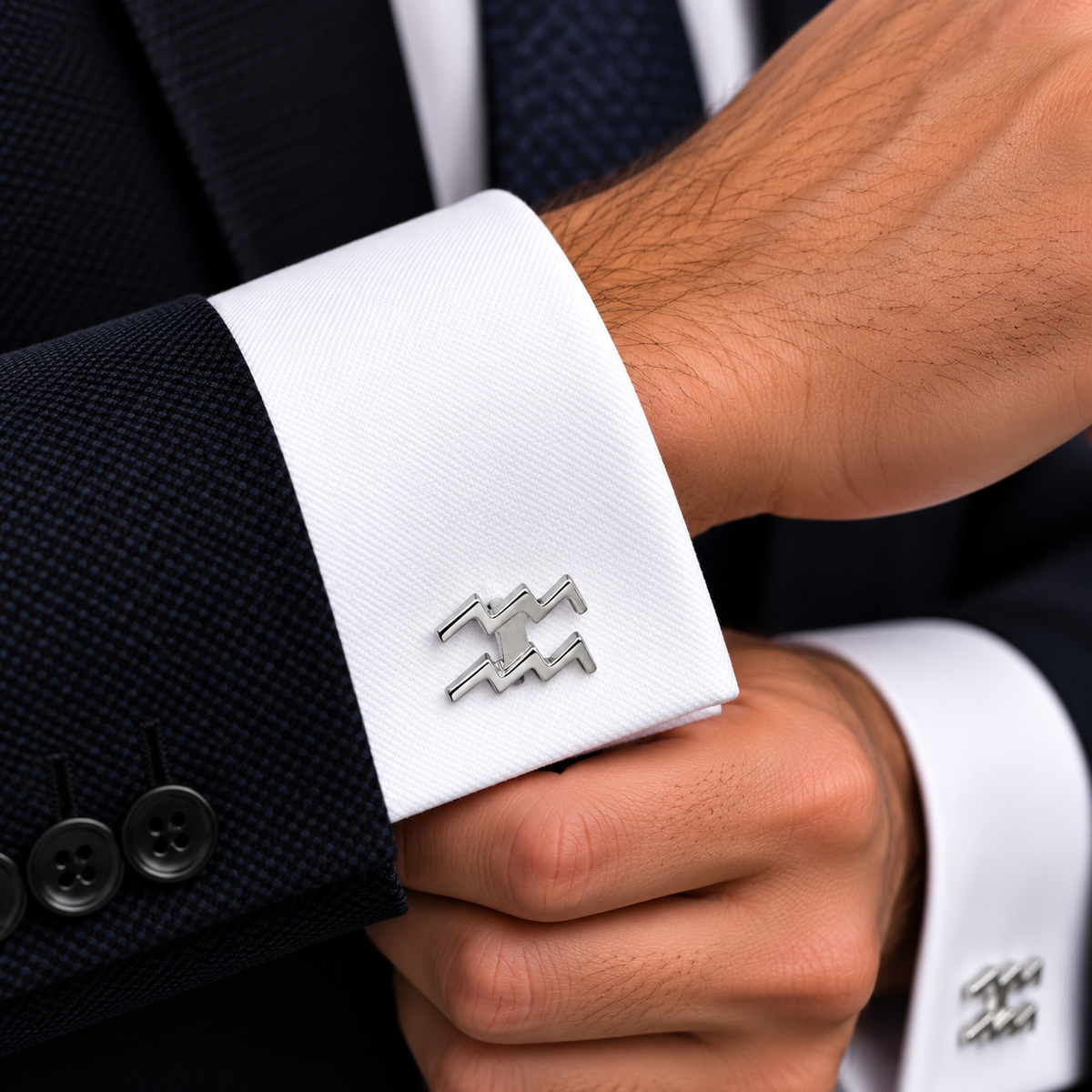Albetro Aquarius zodiac silver cufflink worn on white French cuff shirt
