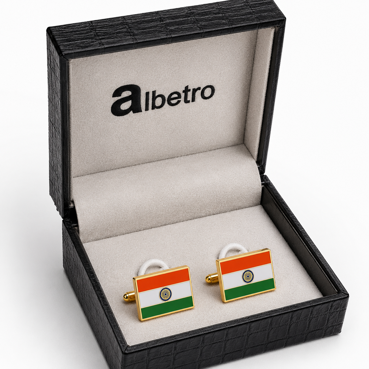 A pair of Italian flag cufflinks displayed inside an open black textured jewelry box with a light beige velvet lining. The brand name 'albetro' is printed on the inside lid.