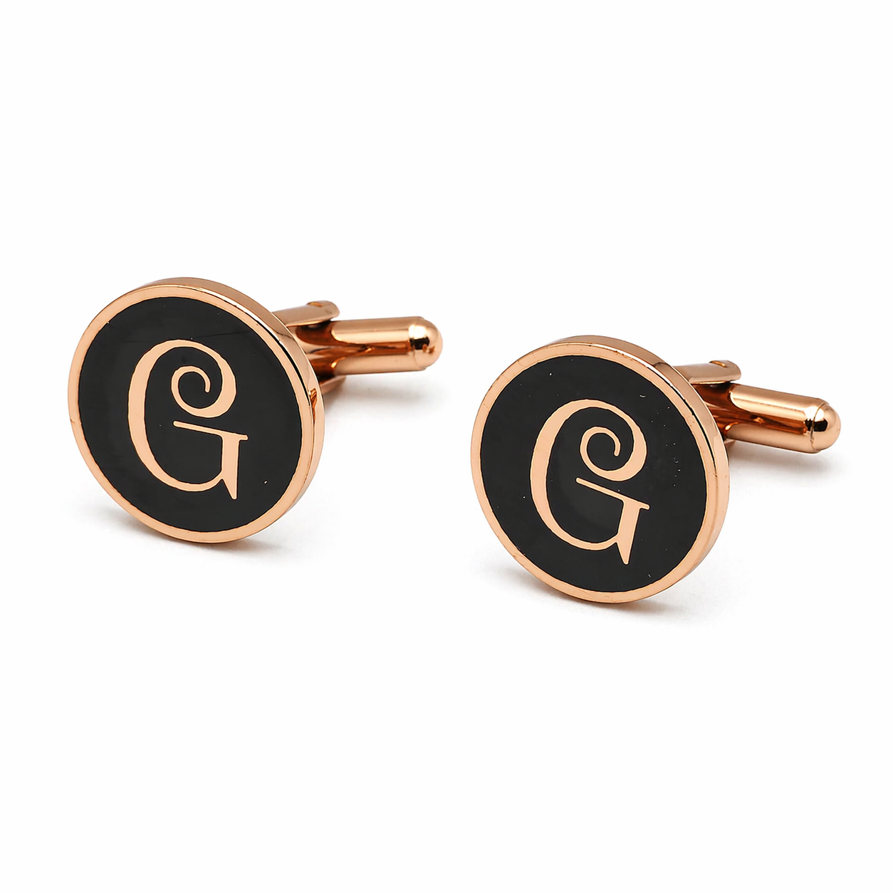 Rose gold cufflinks with black circular stones featuring a monogram on a white background