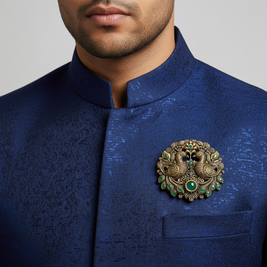 Royal Mayur Heritage Brooch – Antique Gold with Emerald Accents