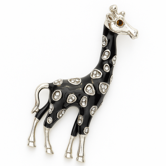 Giraffe-shaped brooch with black and white design on a white background