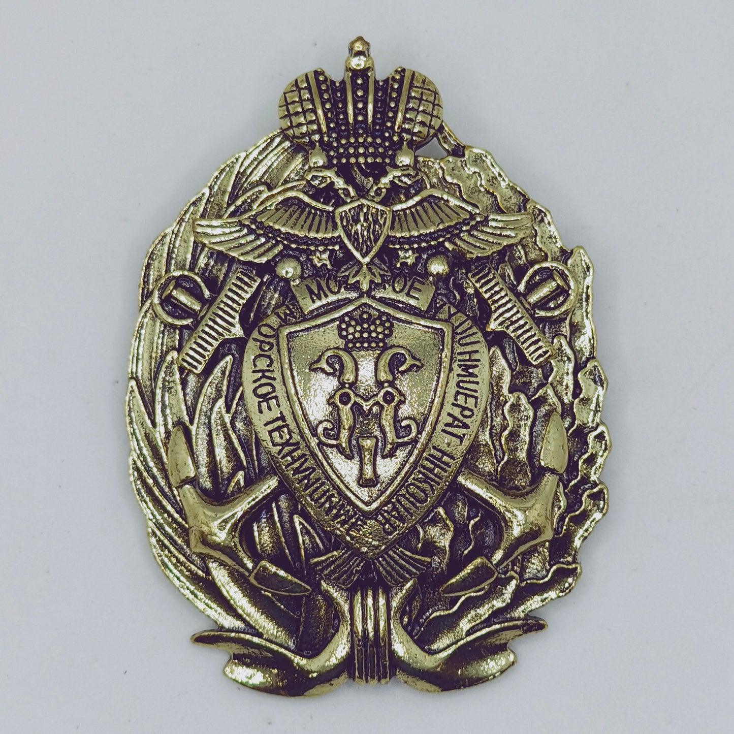 Bronze military badge with intricate