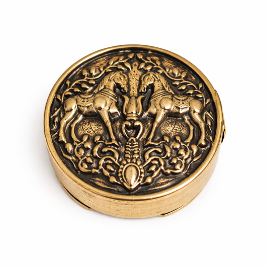 Decorative round object with intricate design on a white background