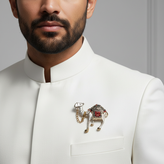 Decorative camel charm with gold chain on a white background