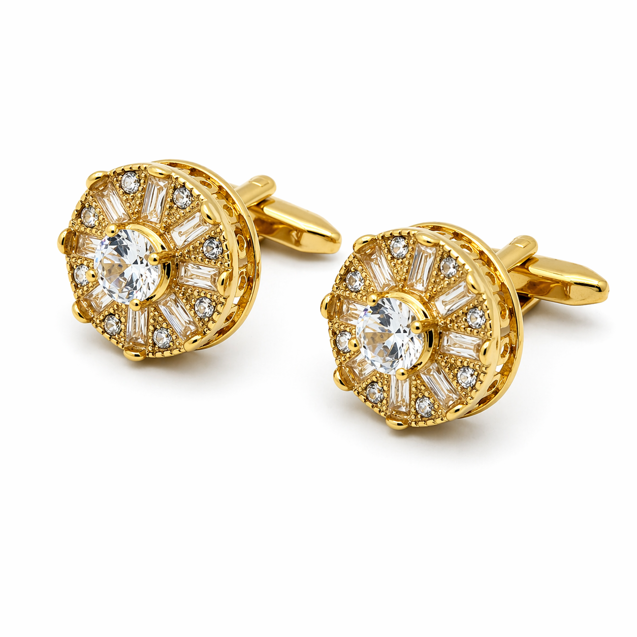 Gold cufflinks with diamond-like stones on a white background