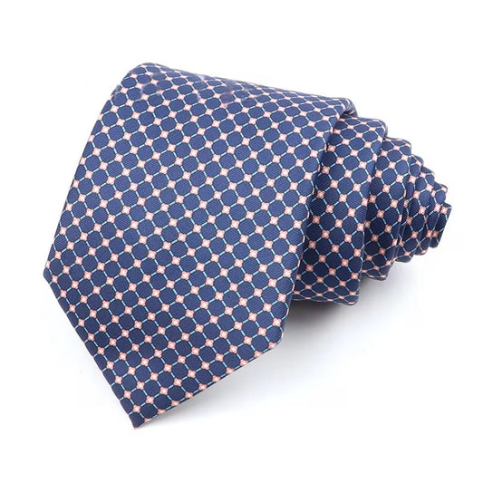 Navy blue tie with pink geometric pattern on a white background