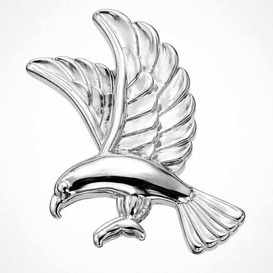 Silver dove-shaped object on a white background