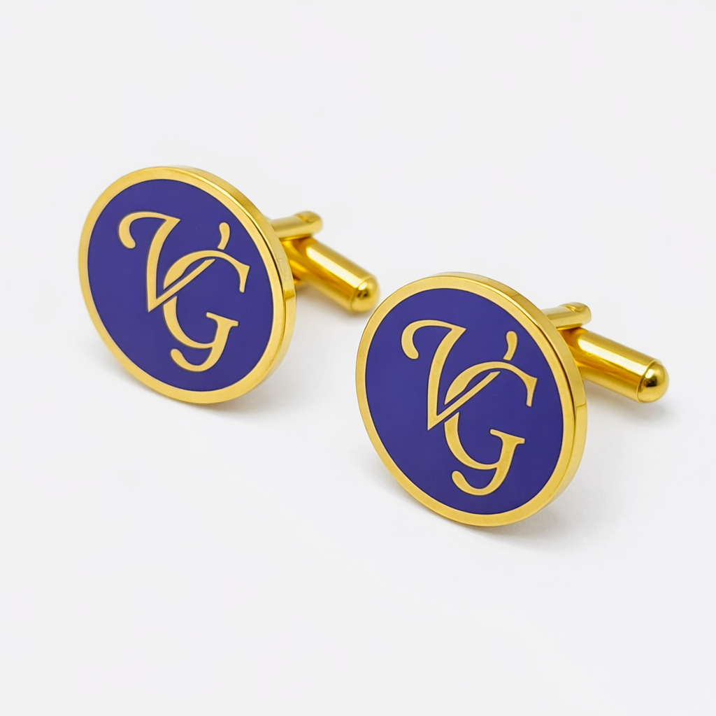 Gold cufflinks with blue circular design featuring 'VG' on a white background