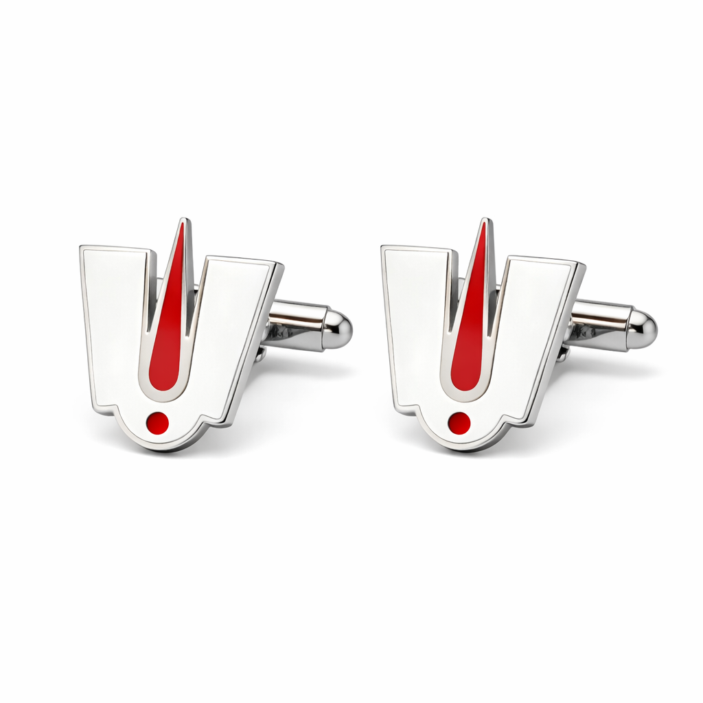 Cufflinks with a geometric design featuring red accents on a white background