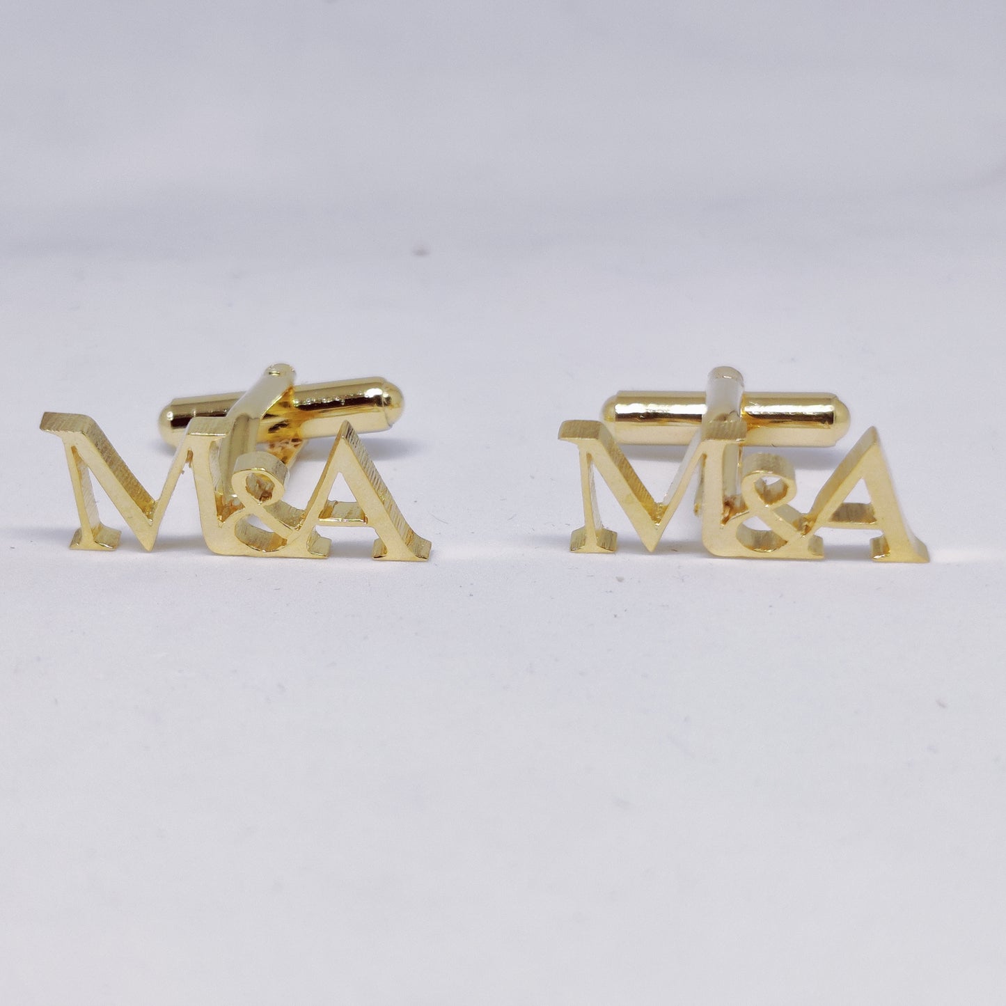 M&A Triple initial cufflinks