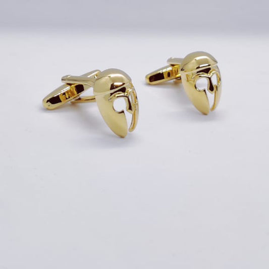 Gold helmet cufflinks